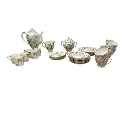 Minton tea service for six decorated with cherry blossom, together with Wedgwood wild strawberry coffee sets 