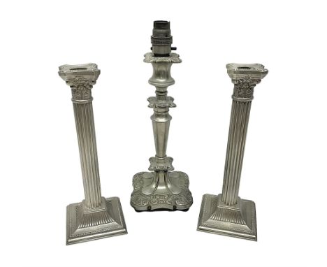 Pair of Corinthian column candlesticks, and a silver plated lamp, candlesticks H26cm