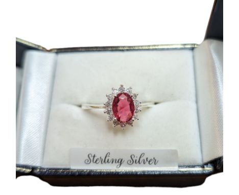 Silver cubic zirconia and pink/red stone cluster ring, stamped 925, boxedCondition Report:Size R