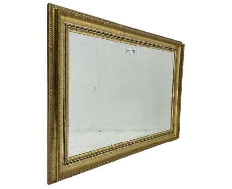 Gilt framed wall mirror with bevelled plate (91cm x 65cm); pair of ladder back carver armchairs (W52cm)Dimensions: Length/Wid