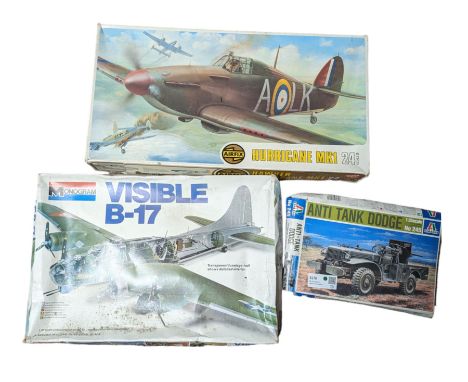 Three model kits, including Airfix Hawker Hurricane MK1 1:24 scale, Italeri Anti Tank Dodge 1:35 scale and Monogram Visible B