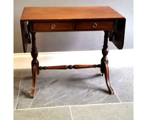 Regency style mahogany sofa table, 141 cm extended, 51.5 cm deep, 73 cm high, water marked top, otherwise used condition. 