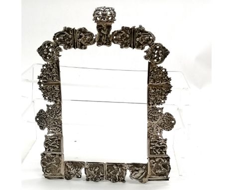 Antique unmarked continental silver frame with unusual construction of cast panels depicting figural detail 20cm x 16cm 167g