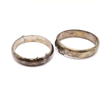 2 x silver hallmarked bangles - engraved bangle has slight dents - total (2) 48g - SOLD ON BEHALF OF THE NEW BREAST CANCER UN