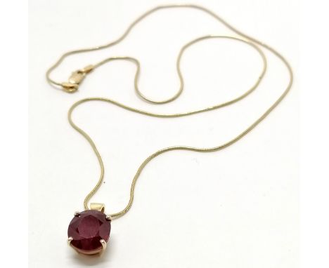 Unmarked gold (touch tests as 14ct) ruby (10.5mm x 9.5mm) pendant on a 9ct marked gold 42cm chain - 4.8g total weight 