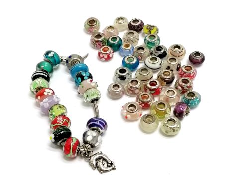 Bacio silver charm bracelet t/w qty of loose associated glass beads marked 925 ~ total weight 143g 