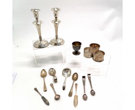 Qty of silver - 3 x napkin rings (all dedicated), egg cup, crossed rifles MRGC spoon, pair of candlesticks (16cm with loaded 