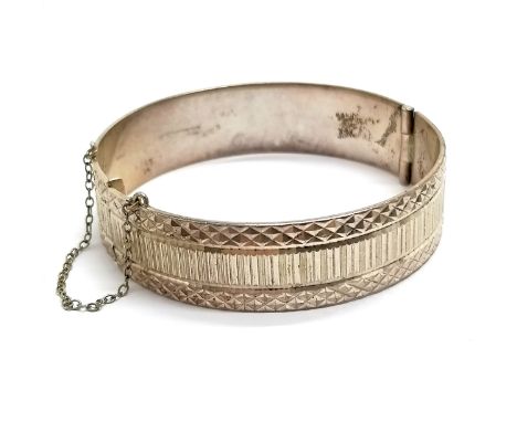 Silver 1972 hallmarked bangle with bright cut detail by RPH - 6cm across &amp; 37g 