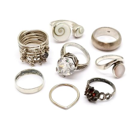 8 x silver rings (1 unmarked) inc garnet, band ring, large pear shaped white stone etc - total weight 43g - SOLD ON BEHALF OF