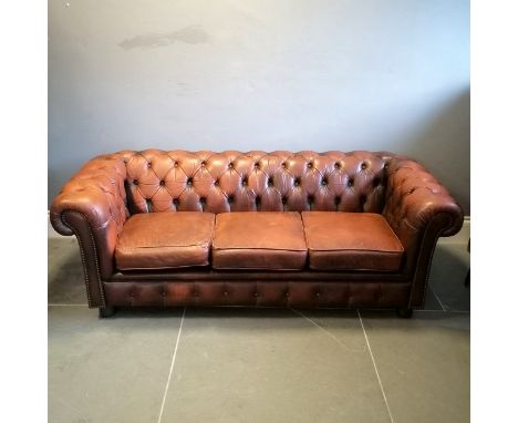 Vintage brown leather button back chesterfield 3 seater sofa 186cm long 82cm deep x 66cm high- has a cigarette burn on the in