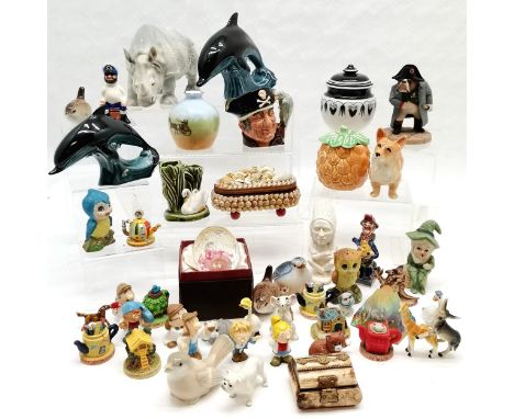 Collection of assorted china to include Poole dolphins, , Royal Doulton toby jug Long John Silver, Sylvac Corgi etc. 