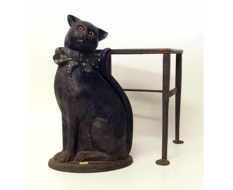 Companion stand moulded cast iron in the form of a cat with glass eyes (tools missing) also George III steel and brass footma