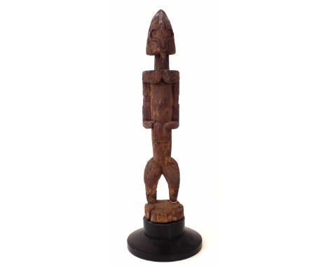Dogon standing figure, 51cm overall height.     All lots in this Tribal and African Art Sale are sold subject to V.A.T. There