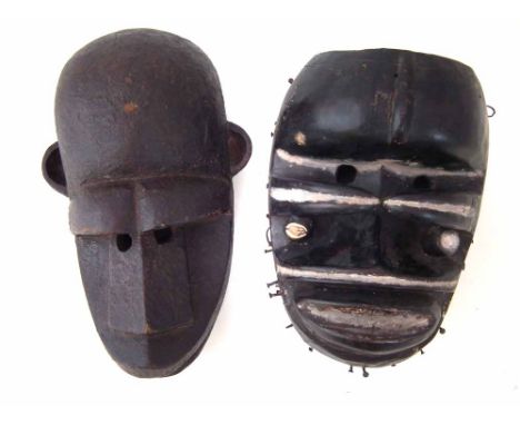 Bete mask and a Bamama monkey mask, the largest measures 30cm high       All lots in this Tribal and African Art Sale are sol
