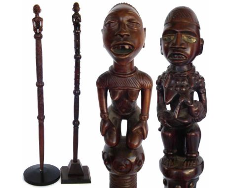 Two Yombe Chiefs staffs carved with maternity figures, the largest measures 118cm high       All lots in this Tribal and Afri