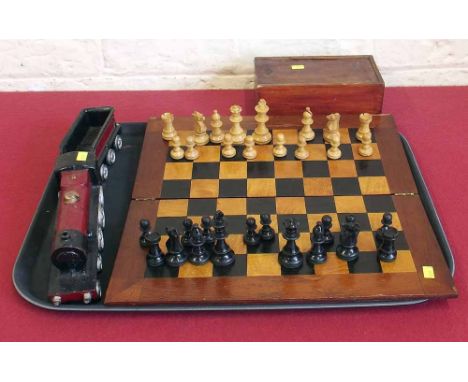 Wallwork's cast iron steam engine/train also a chess set and board. Condition report: see terms and conditions