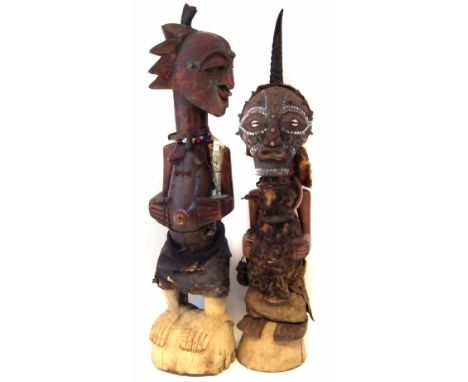 Two Songye Nkisi power figures, the largest measures 94cm high     All lots in this Tribal and African Art Sale are sold subj