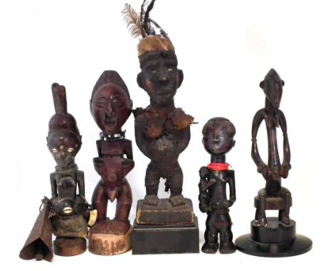 Congo fetish figure, three Songye figures and a Senufo figure, the largest measures 42cm high     All lots in this Tribal and