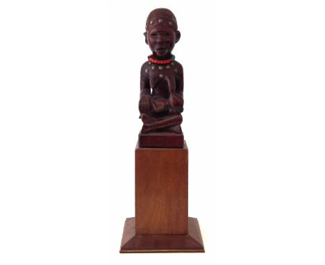 Yombe maternity figure, 31cm high excluding base.       All lots in this Tribal and African Art Sale are sold subject to V.A.