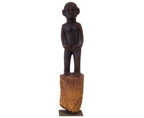 Standing figural post, possibly Lobi, 96cm high    All lots in this Tribal and African Art Sale are sold subject to V.A.T. Th