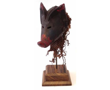 Chokwe Ngulu pig mask, 29cm long      All lots in this Tribal and African Art Sale are sold subject to V.A.T. Therefore £100 