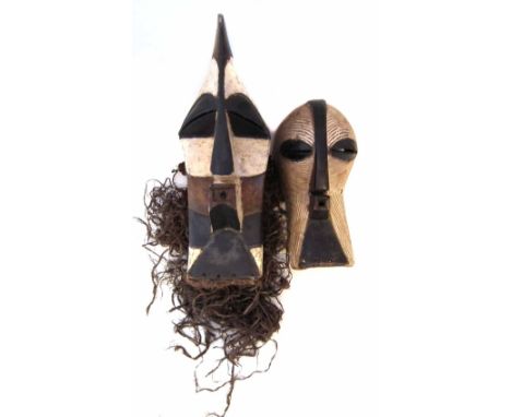Two Songye Kifwebe masks, the largest measures 52cm high     All lots in this Tribal and African Art Sale are sold subject to
