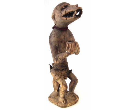 Baule Mbotumbo monkey figure, 56cm high       All lots in this Tribal and African Art Sale are sold subject to V.A.T. Therefo