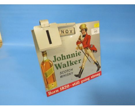 A VINTAGE METAL ADVERTISING SIGN AND DESK CALENDAR FOR JOHNNIE WALKER SCOTCH WHISKY