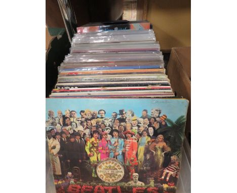 OVER 100 LP RECORDS ARTISTS INCLUDE THE BEATLES, WINGS, STATUS QUO, DONOVAN, NEIL DIAMOND, MARC BOLAN, BOB DYLAN, KYLIE MINOG