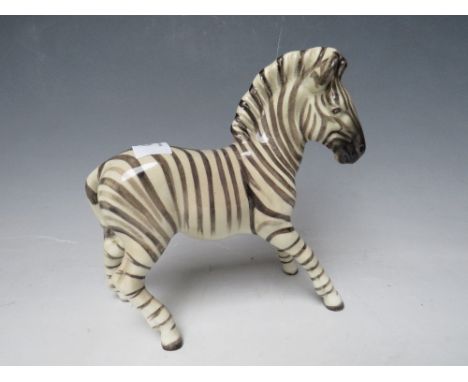 A BESWICK MODEL OF A ZEBRA 