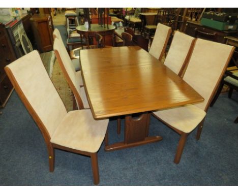 A MODERN ERCOL DRAWLEAF DINING TABLE AND 6 CHAIRS