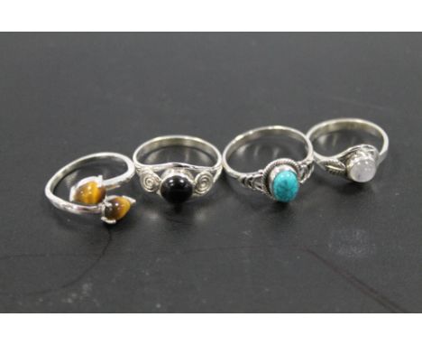 A COLLECTION OF 4 VINTAGE 925 SILVER GEMSTONE DRESS RINGS TO INCLUDE  OPAL, TURQUOISE, TIGERS EYE ETC