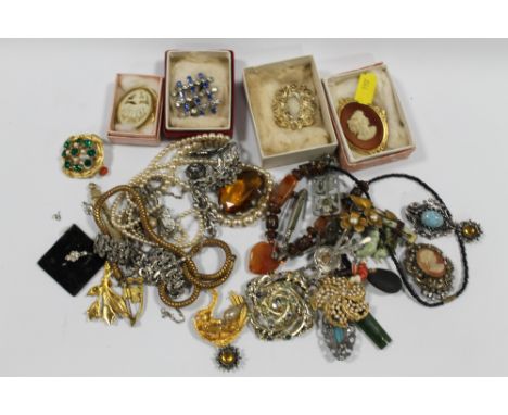 A BOX OF VINTAGE COSTUME JEWELLERY TO INCLUDE MIRACLE BROOCH ETC