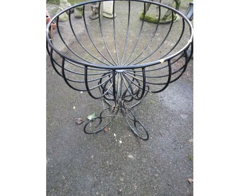 A WROUGHT IRON PLANTER GARDEN STAND