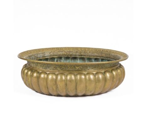 An exceptionally large oval brass basin or cooler, Milan, Italy, 19th C.H 97 x L 75 x D 31 cm Bearing a maker's mark G. MOVI 