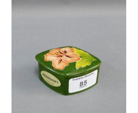 Walter Moorcroft green glazed trinket jar and cover, 8cm long