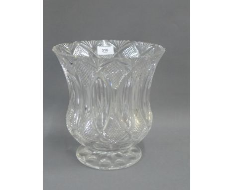 Large cut glass vase with serrated edge and circular footrim, 25cm high