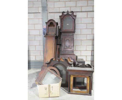 Five assorted longcase clock casesTo include 18th Century oak examples, early 19th Century mahogany longcases along with a co