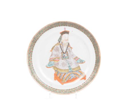 A Chinse famille rose 'Official' plate, mid 18th Century Modelled as an official wearing robes detailed with a sixth civil ra