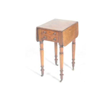 A 19th Century mahogany work tableWith a rectangular drop leaf top above two drawers opposed by two faux drawers each applied