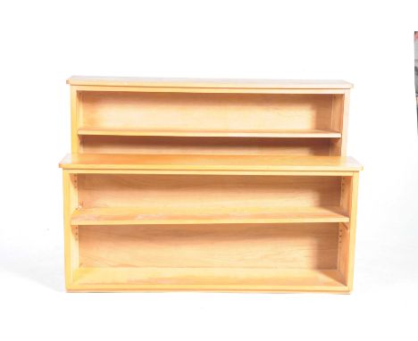 Two modern pine open bookcasesThe first with two adjustable shelves, the second bookcase with a single shelf, width of larges