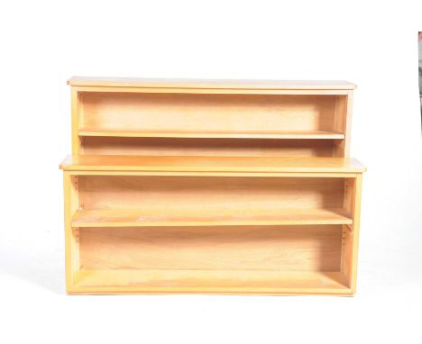 Two modern pine open bookcasesThe first with two adjustable shelves, the second bookcase with a single shelf, width of larges