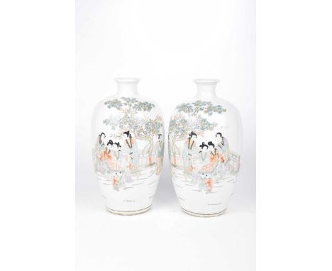 A pair of Chinese famille rose vases, Kangxi 1662-1722) four character mark, 20th Century Each of ovoid form, with short ever