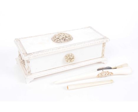 A Chinese Canton ivory jewellery box, circa 1880-1900The rectangular section box raised on bracket support, the plain carved 