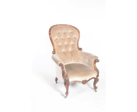 A Victorian mahogany and upholstered balloon back drawing room chairThe balloon back with a mahogany frame and padded button 