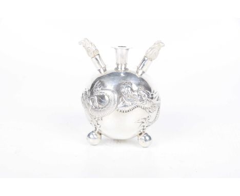 Chinese export silver table lighter, early 20th CenturyWang Hing & Co., Hong Kong, of rounded form rising on three ball feet 