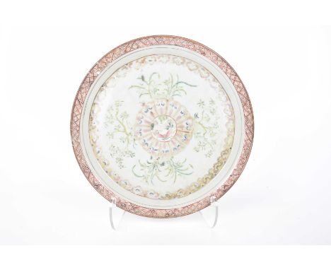 A Chinese famille rose charger, early 19th Century Of circular form, the heavily potted charger, raised on scalloped bracket 