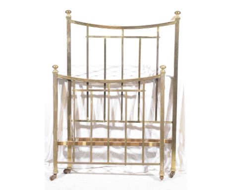 A Victorian brass single bedThe square section tubular frame with button shaped finials, raised on castors, head board width 