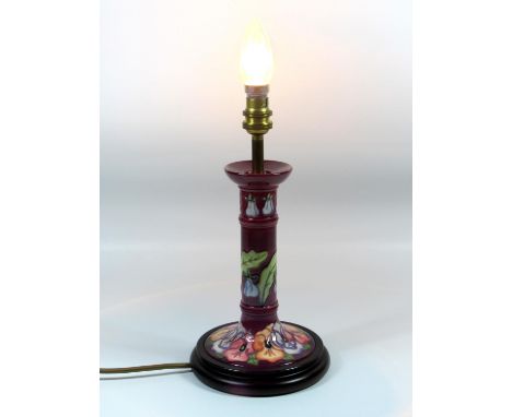 A MOORCROFT POTTERY TABLE LAMP BASE, CIRCA 1990'S, OF  CANDLESTICK FORM, TUBE LINED AND PAINTED WITH THE '      'PATTERN, ON 