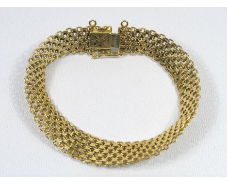 SPANISH YELLOW METAL MILANESE STYLE BRACELET BY L K STAMPED 18K, 21.4 GRAMS. 